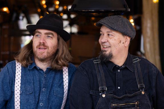 Gabriel McCaslin and João Luz clowning for the camera after their performance at Gans am Wasser, Munich.
